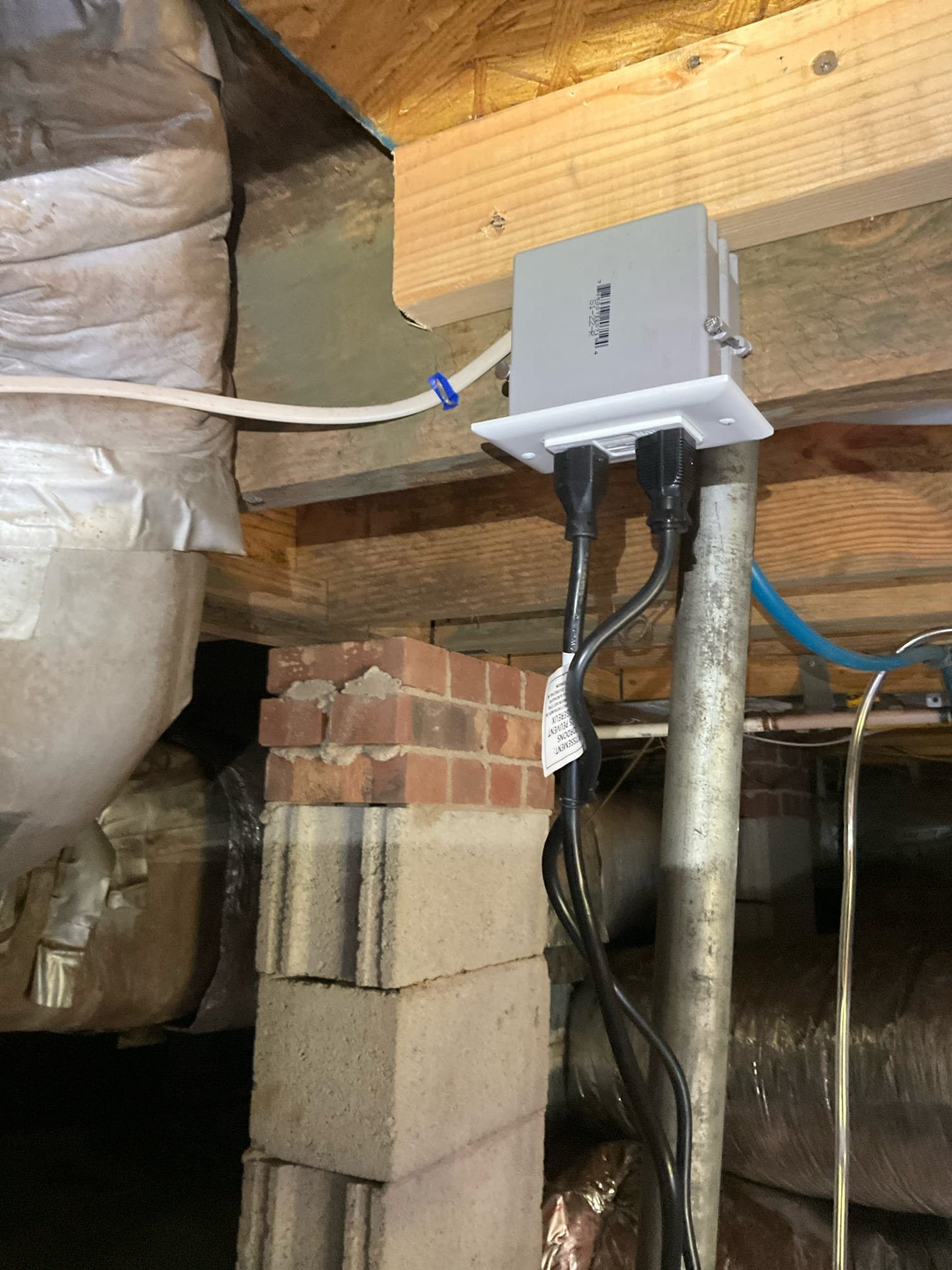 Touchstone Electric technician upgrading outlets and switches