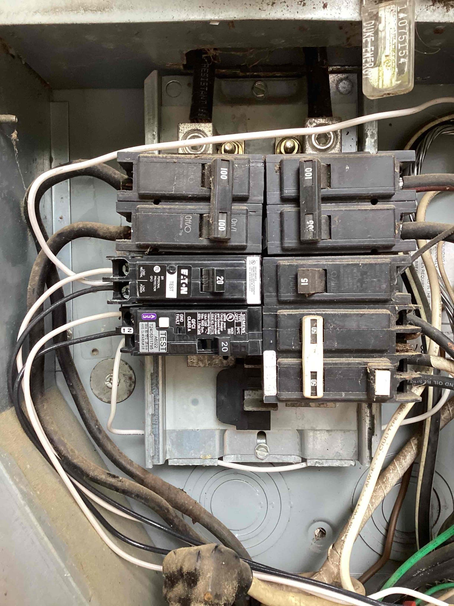 Touchstone Electric electrician completing an electrical panel upgrade
