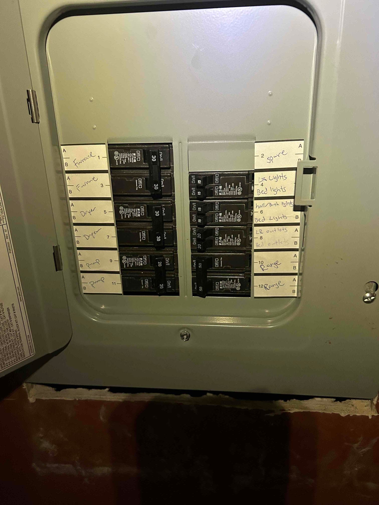 Electrician planning subpanel installation work