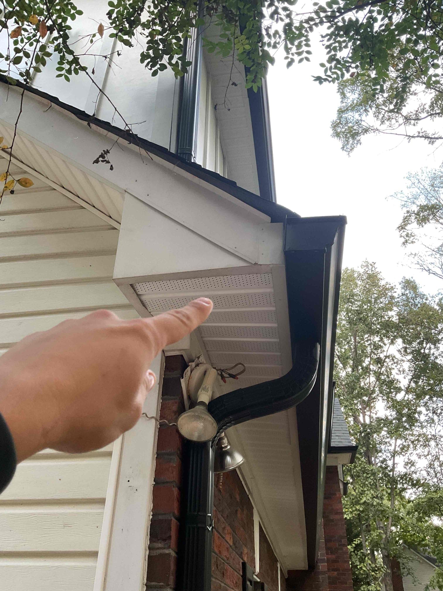 Touchstone Electric technician diagnosing an electrical issue