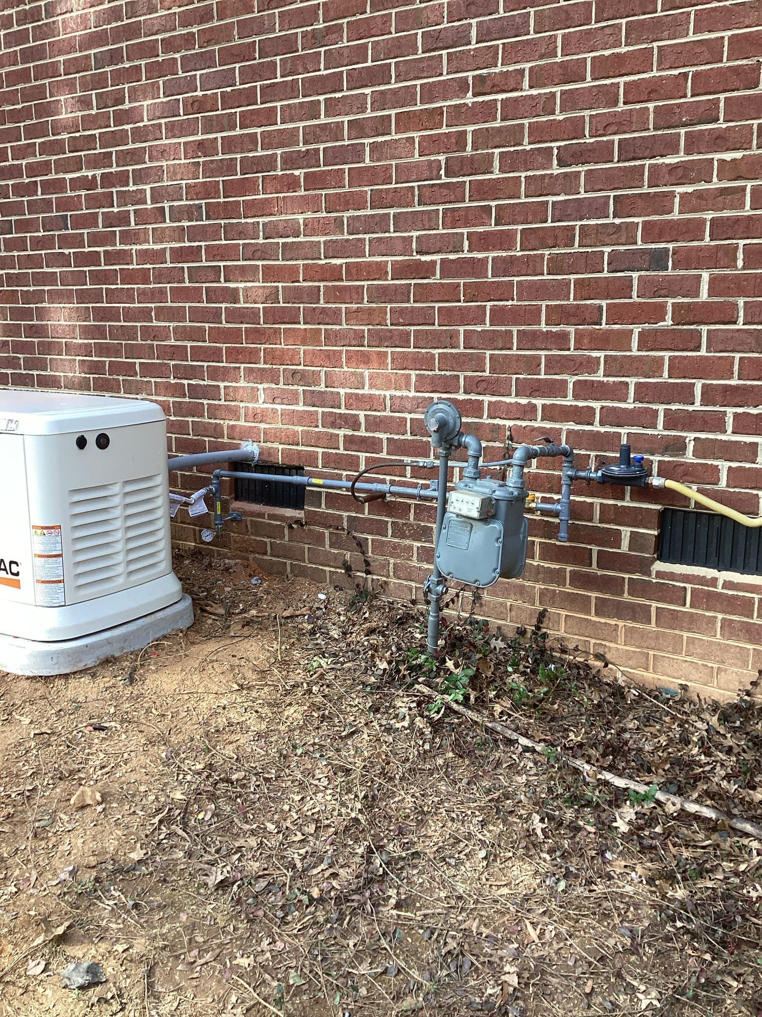 Electrician assessing electrical needs for whole-home generator installation